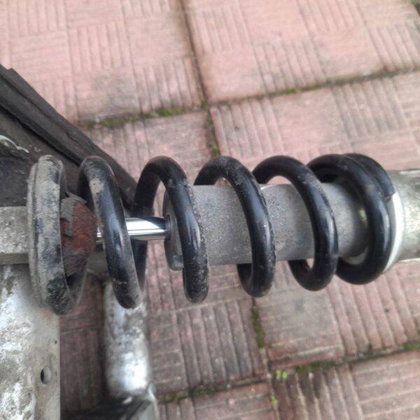 Задний амортизатор